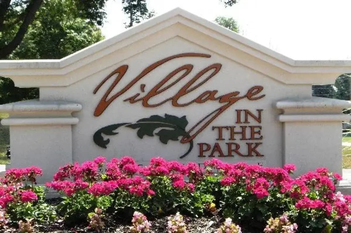 Milwaukee apartments for rent - image - wi-greendale-villageinthepark-p0108216-01-sign-with-flowers-resized-1-photogallery_orig.jpg