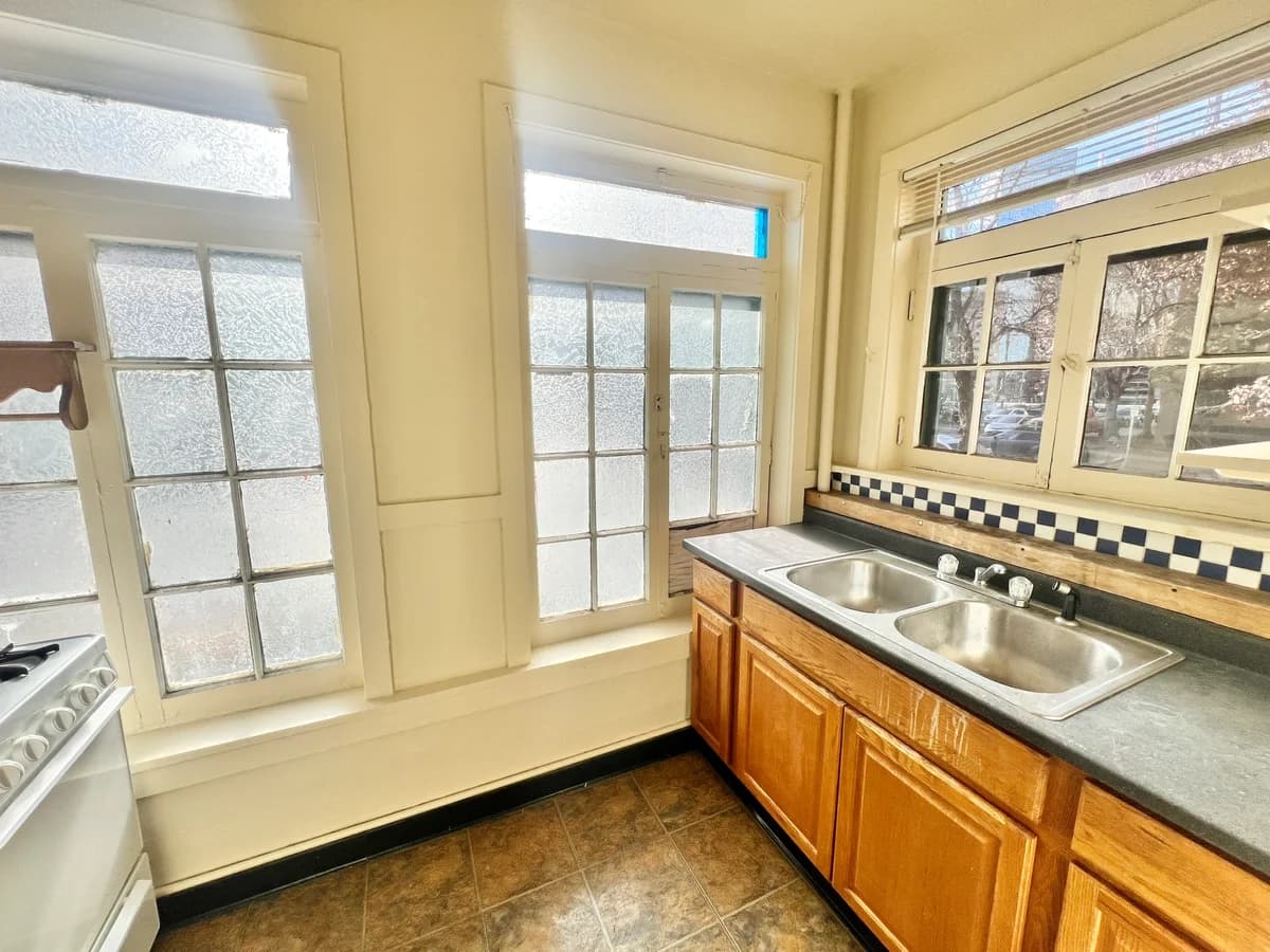Milwaukee apartments for rent - image - Experience the warmth and light in this welcoming kitchen space, perfect for culinary inspiration.