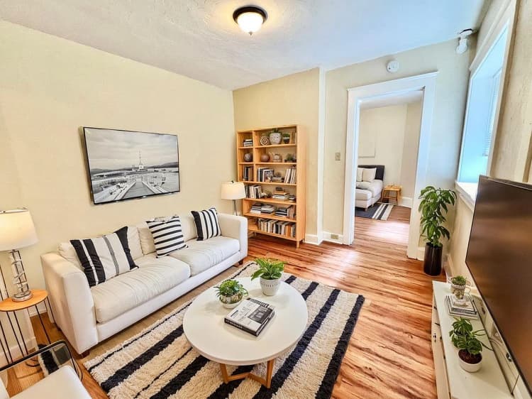 Milwaukee apartments for rent - image - Immerse yourself in the tranquility of this chic urban bedroom, perfect for comfort and relaxation.